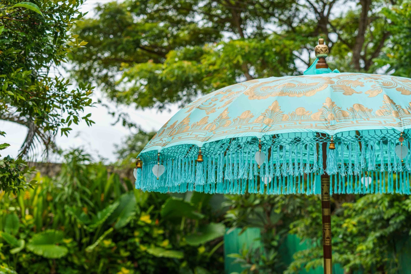 Aquamarine Bali umbrella · Turquoise · hand-worked deep-teal scrollwork